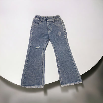 Flared distressed fringe bottom jeans