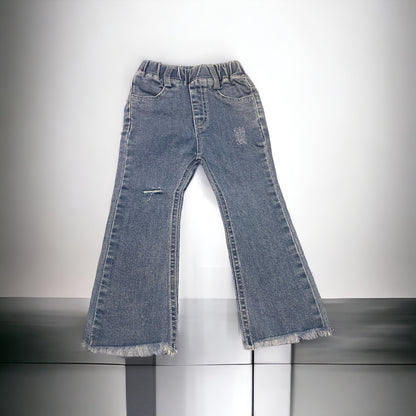 Flared distressed fringe bottom jeans